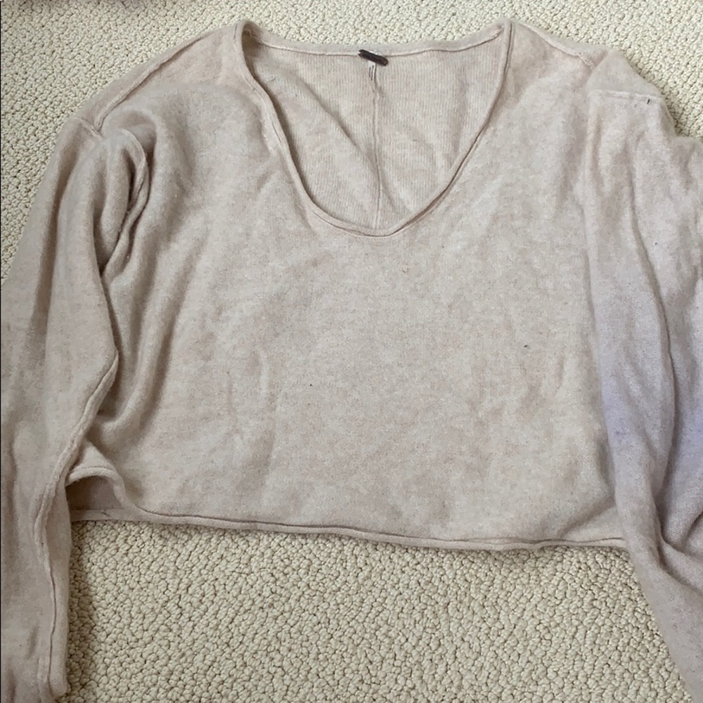 Free People cashmere sweater cream stained sleeve